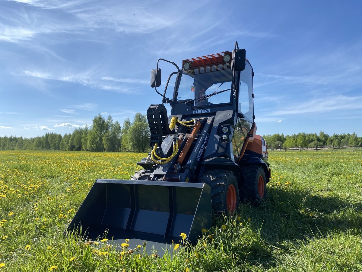 Фронтальный погрузчик Нева с кабиной (RUS, ММЗ-3LDT, 42 л.с., 60 л/мин, грузоподъемность 1200 кг, 2100 кг)