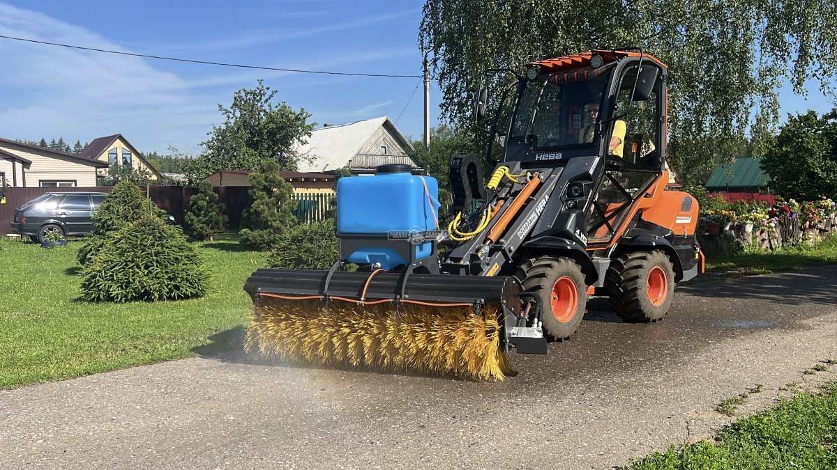 Фронтальный погрузчик Нева с кабиной (RUS, ММЗ-3LDT, 42 л.с., 60 л/мин, грузоподъемность 1200 кг, 2100 кг)