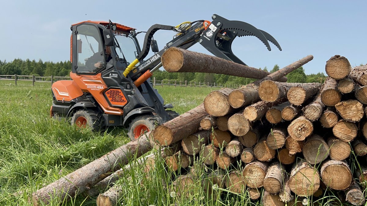 Фронтальный погрузчик Нева с кабиной (RUS, ММЗ-3LDT, 42 л.с., 60 л/мин, грузоподъемность 1200 кг, 2100 кг)
